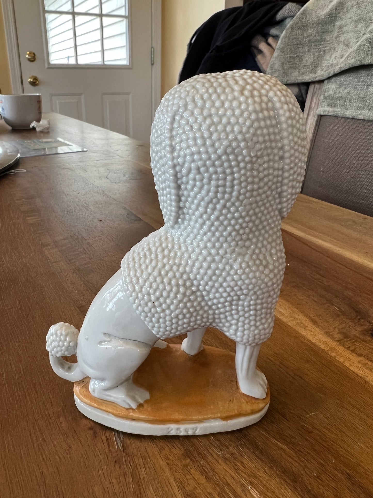 Antique German Staffordshire Poodle with Basket.